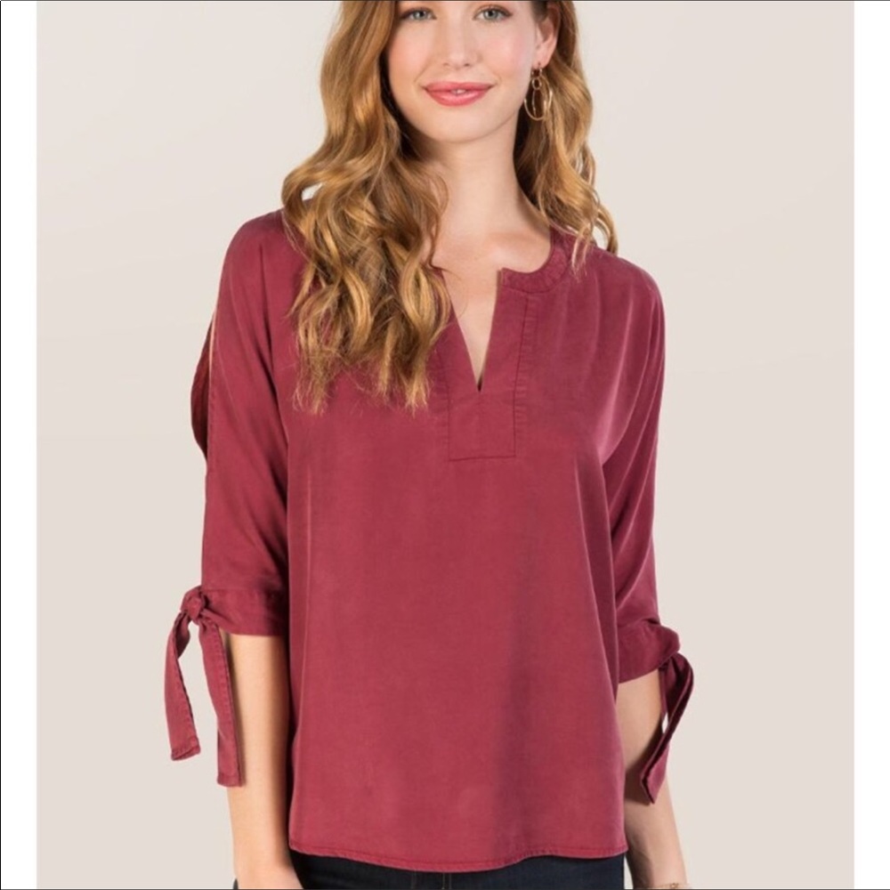 Francesca’s quarter sleeve cold shoulder top
